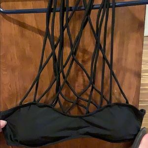 New Sexy, strappy black bikini with halter tie.